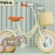 Pastel yellow kids folding bike vintage style